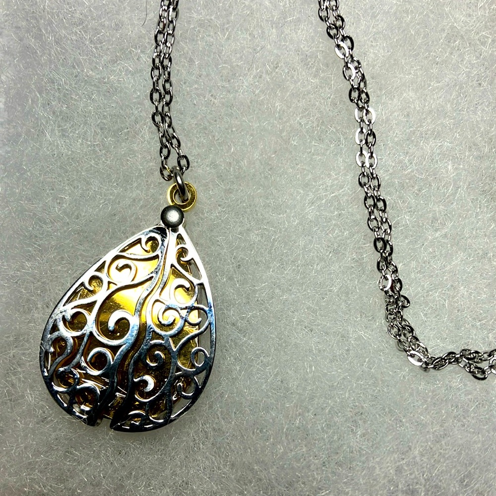 NWT Tear Shaped pendant with a hidden pendant with a small gemstone